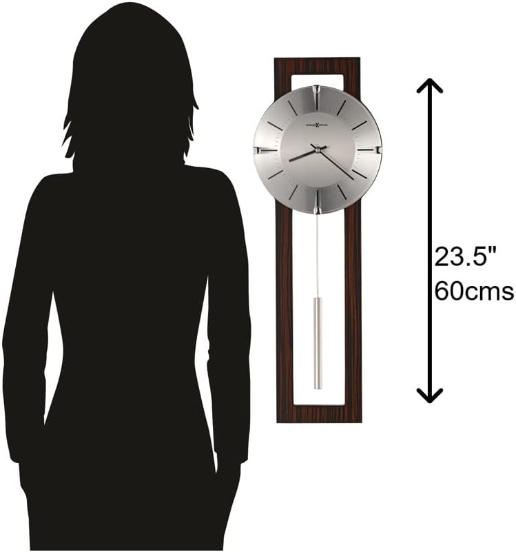 A wall clock with a dark wood rectangular frame and a silver round face is shown next to a black silhouette of a person for size comparison, with text indicating 23.5 inches (60 cm) height.