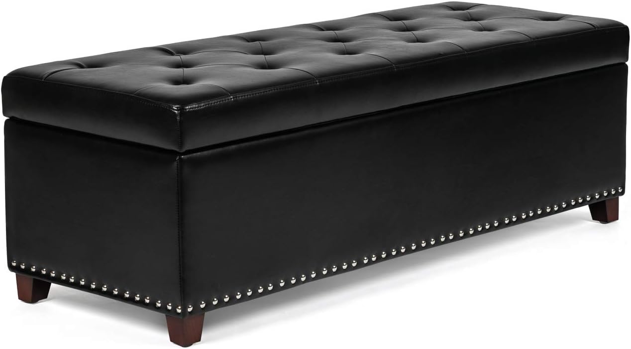 Black tufted storage bench with nailhead trim on a white background