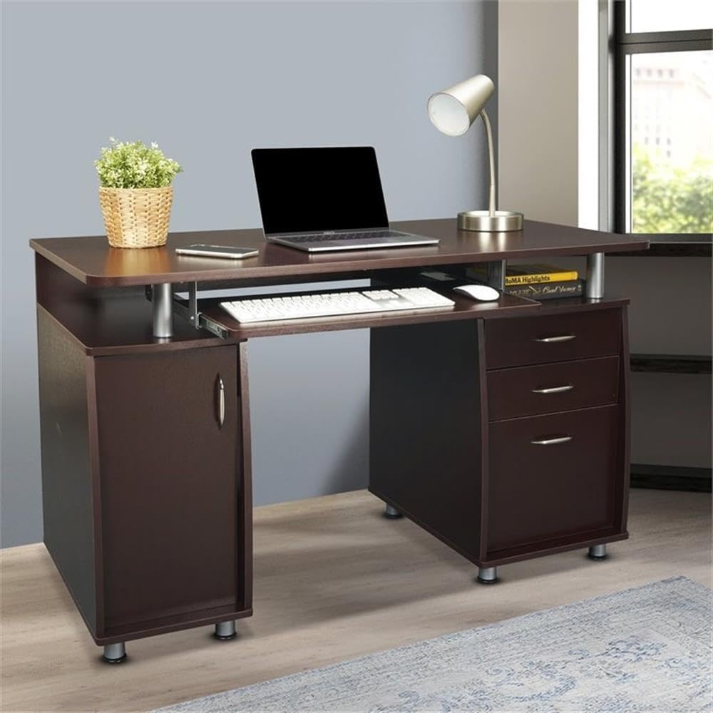 Brown L-shaped desk with office items in a room with a window.