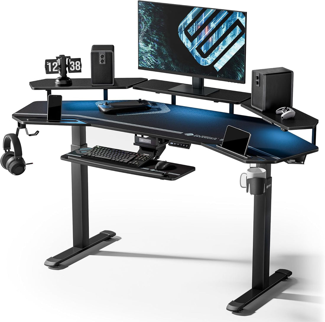 Black and blue gaming desk with computer setup on a white background