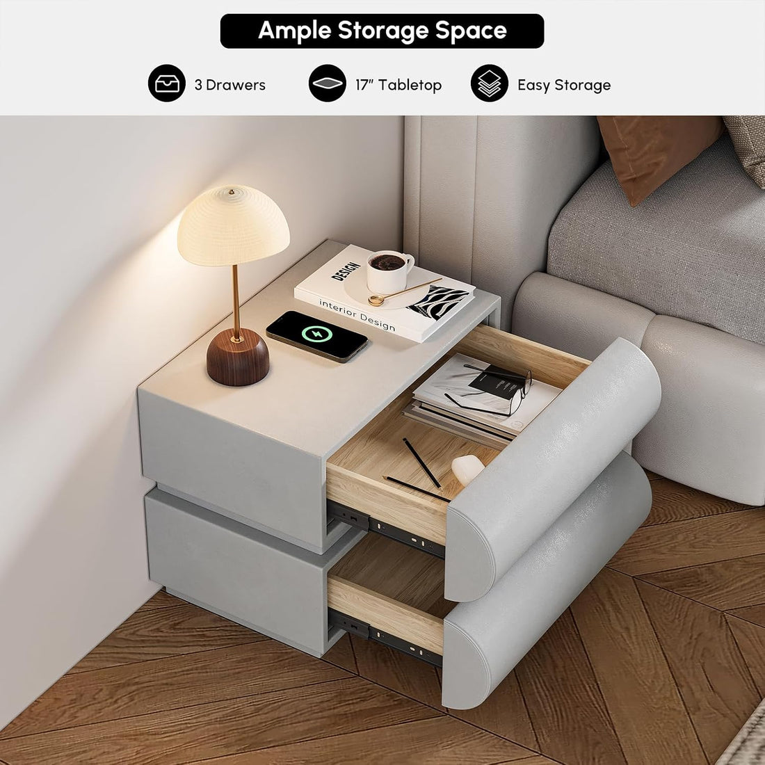 Gray sofa with a side table featuring storage drawers in a living room setting.