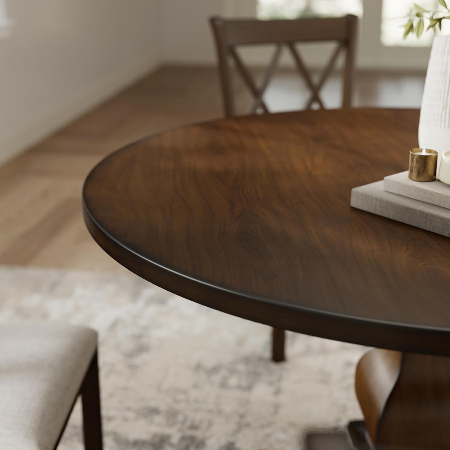 Wooden dining table with chairs in a softly lit room