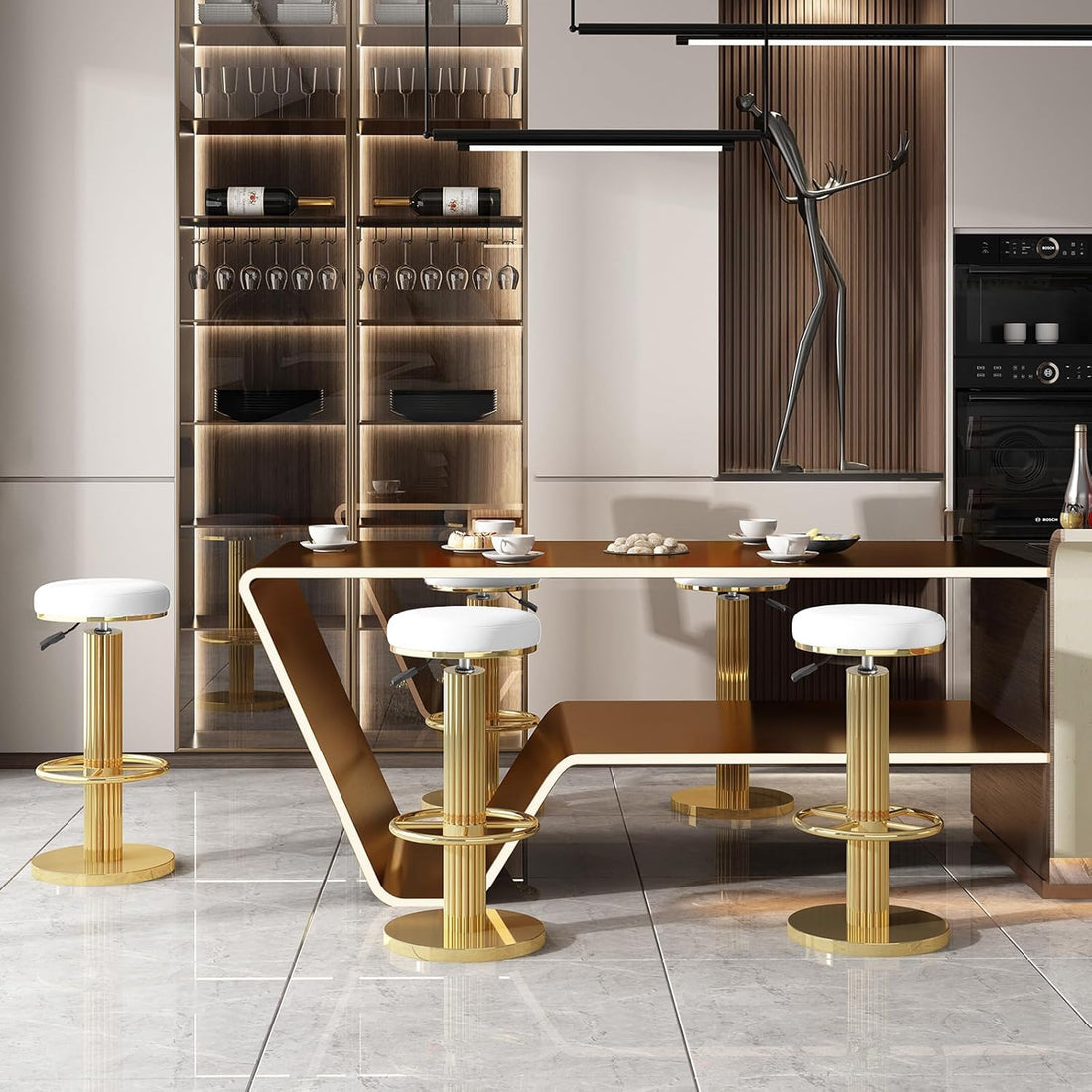 Modern kitchen with a glass dining table and gold bar stools.