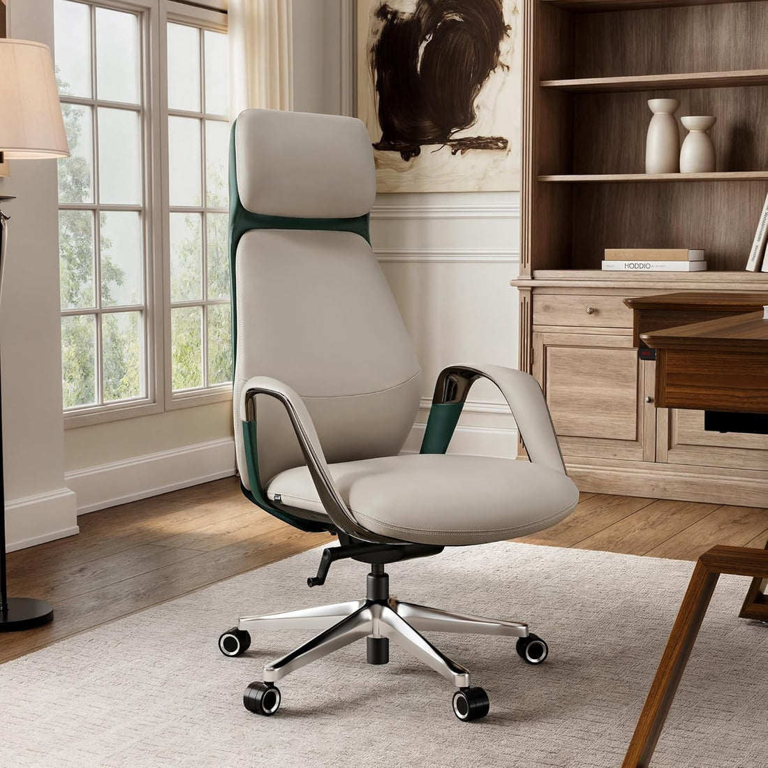 Beige office chair in a home office setting with a desk and window.