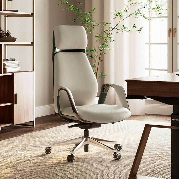 White office chair in a modern office setting with a desk and bookshelf.