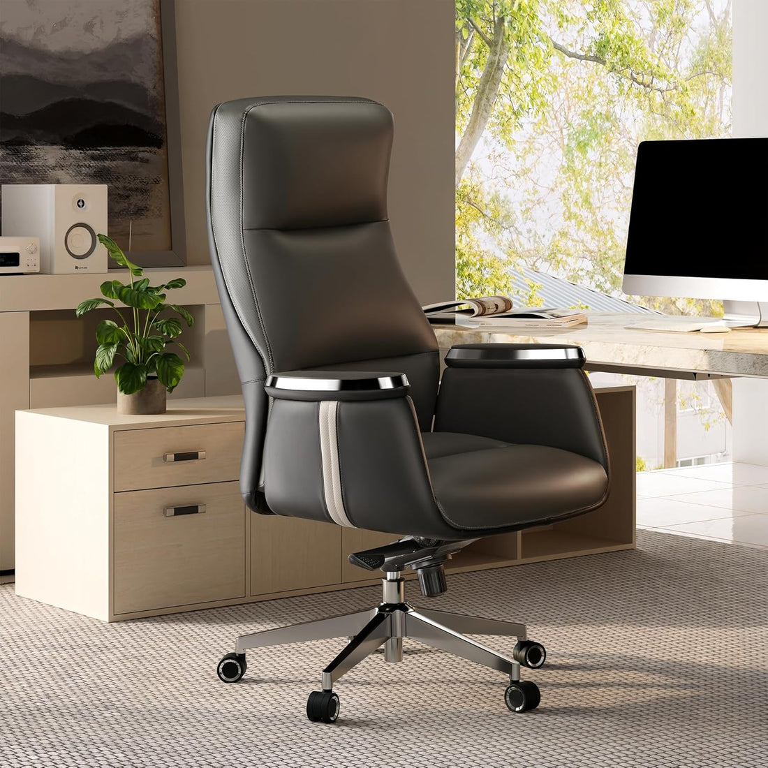 Black office chair in a modern office setting with a desk and decor.