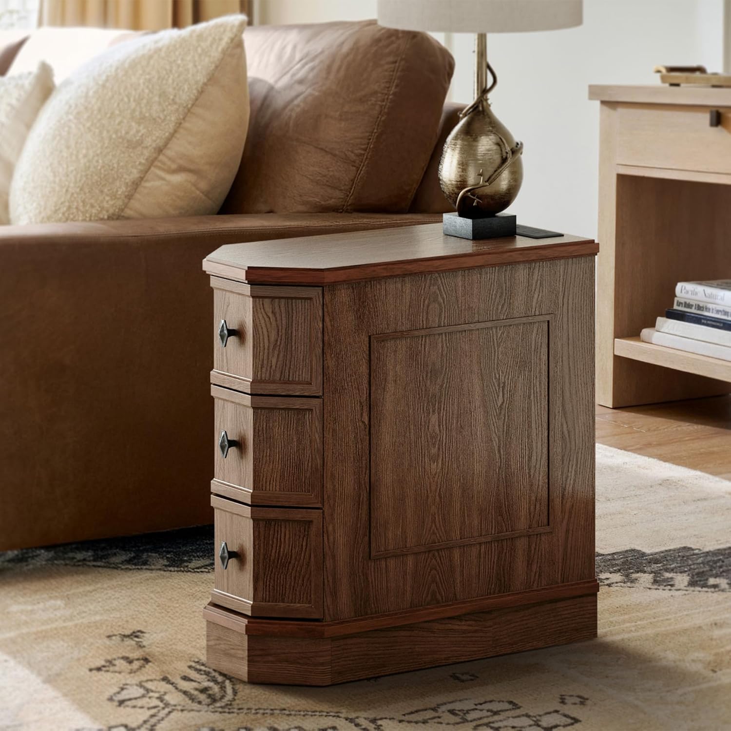 Wooden side table with drawers in a living room setting
