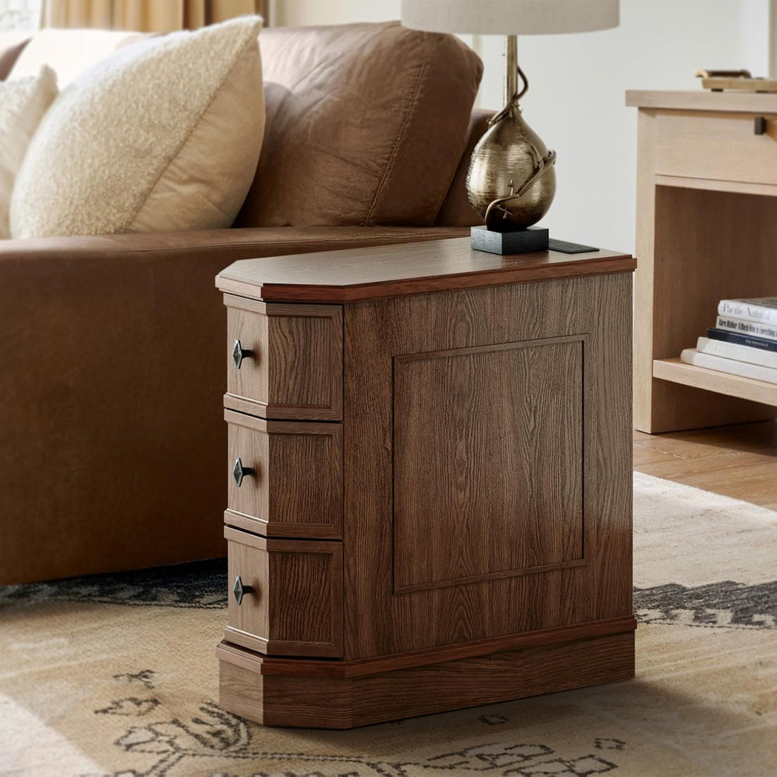 Wooden side table with drawers in a living room setting
