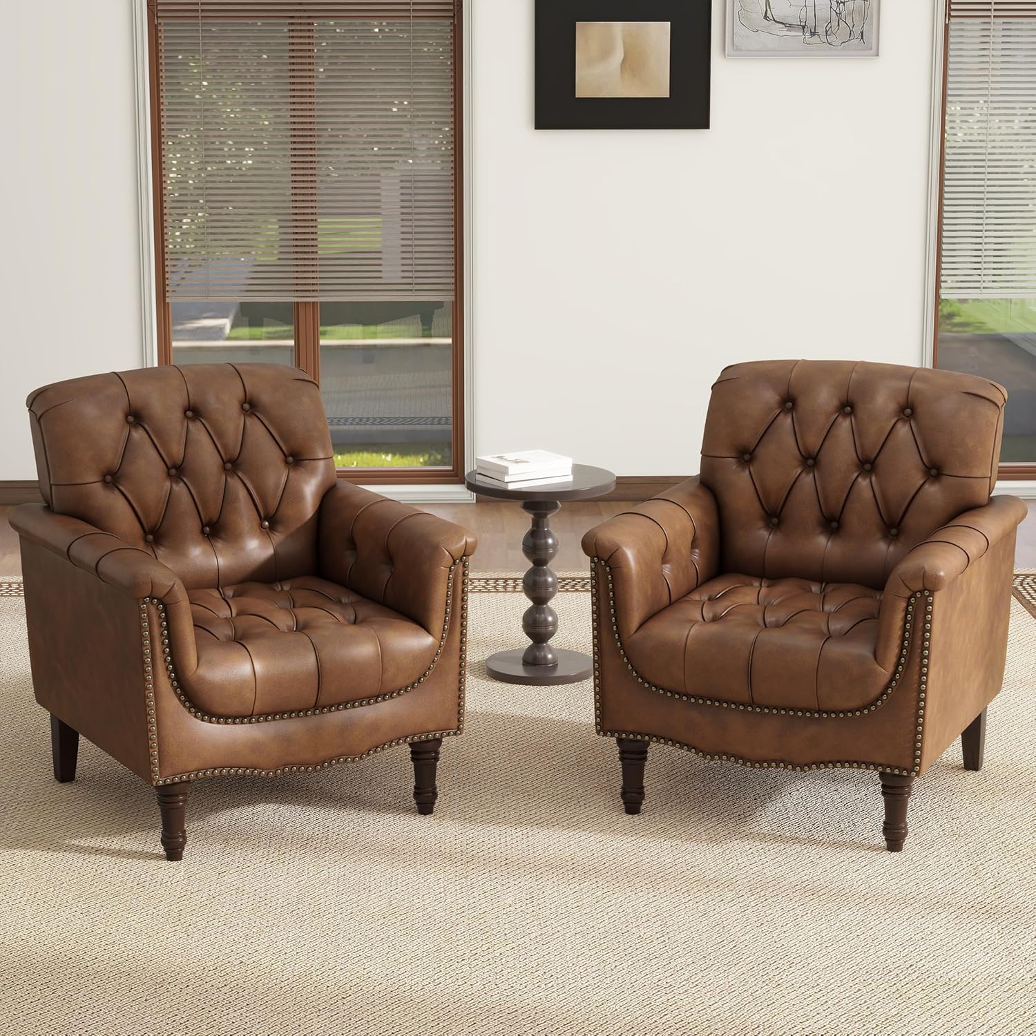 Two brown leather armchairs in a room with a small table and window blinds.