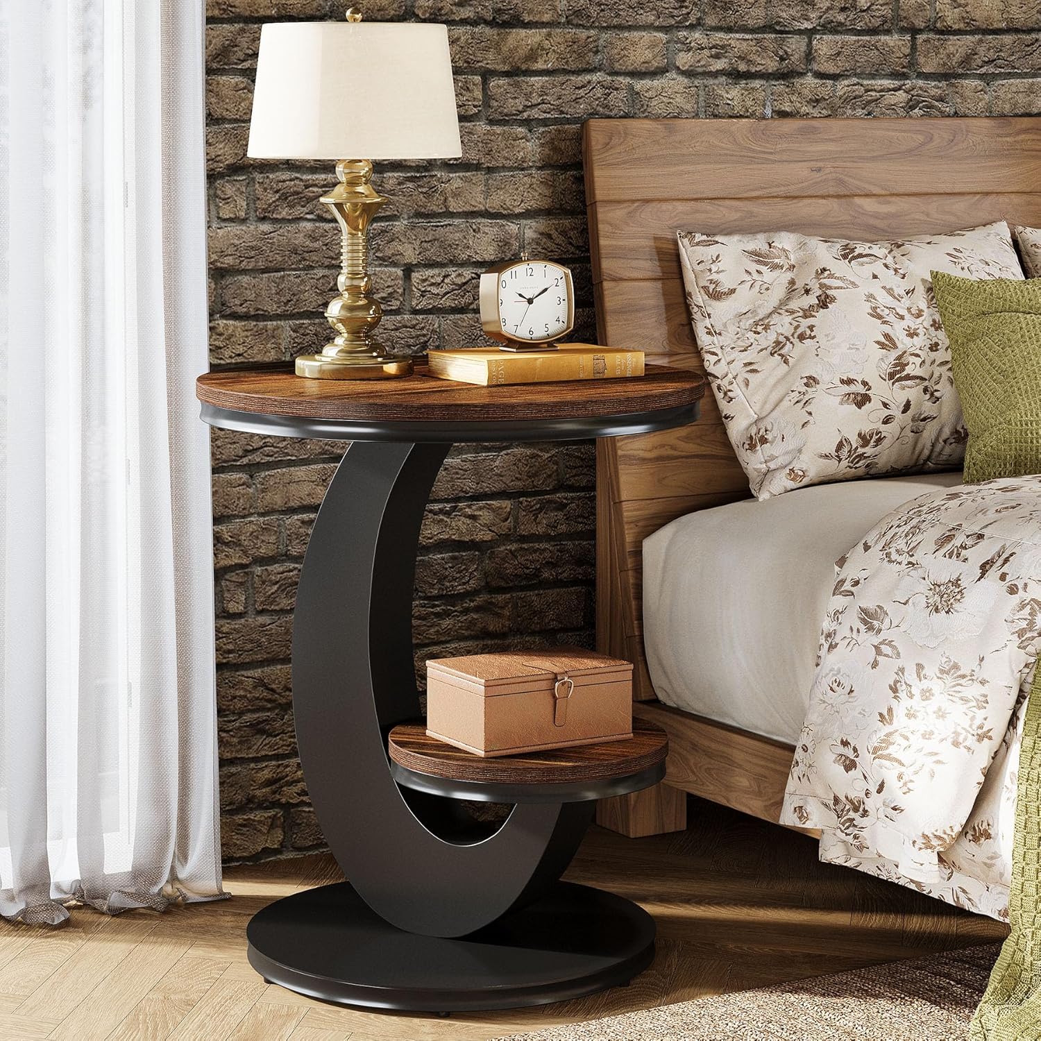 Bedroom with wooden nightstand, lamp, and clock against a stone wall.
