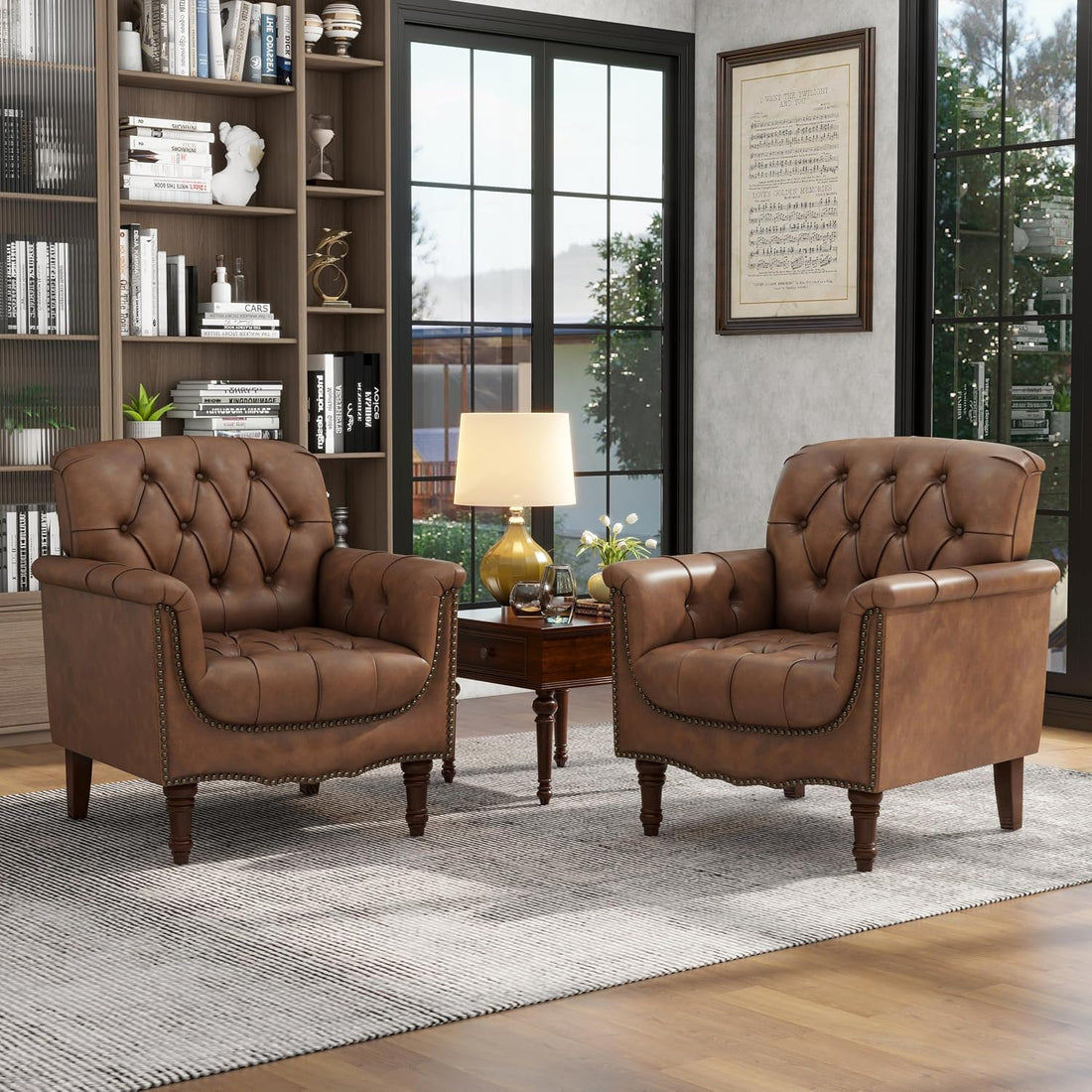 Two brown leather armchairs in a living room setting with bookshelves and a lamp.