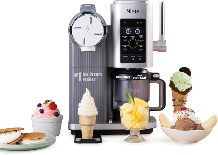 Ninja ice cream maker with various ice cream cones and bowls on a white background