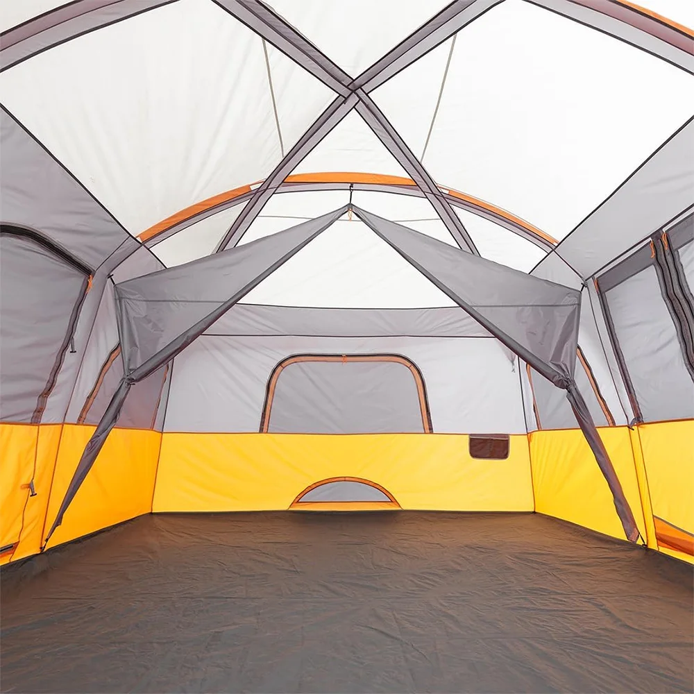 Interior of a camping tent with gray and yellow walls.