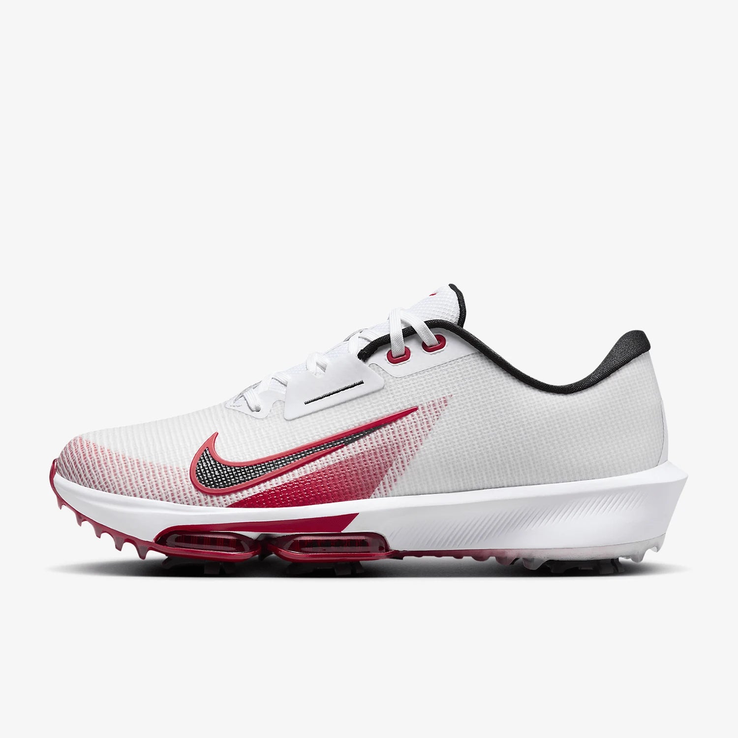 A Nike golf shoe in white, red, and black, featuring a white mesh upper, a red gradient Swoosh, and a white sole with red air cushioning.