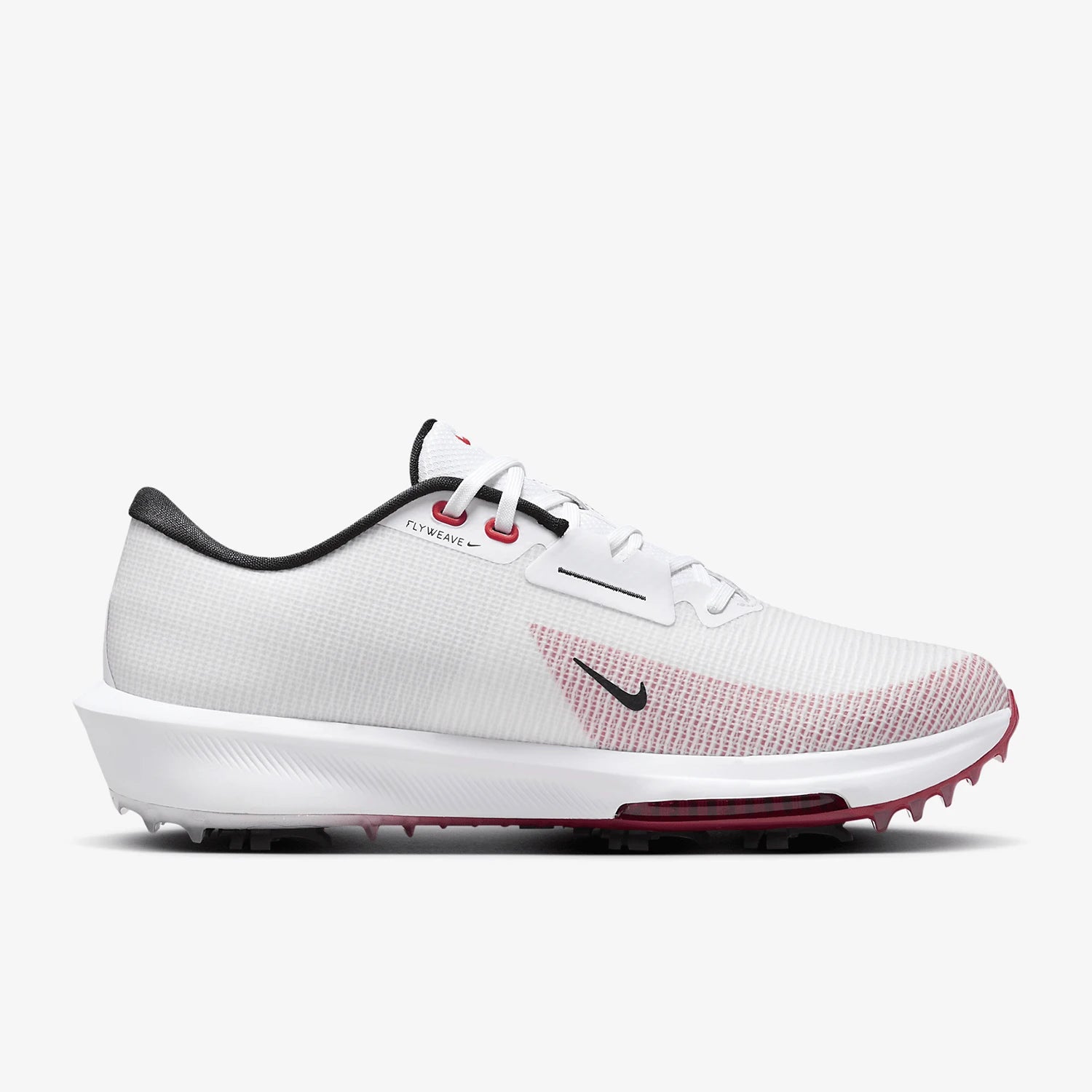 A Nike golf shoe in white with a textured knit upper, a black swoosh, and a pinkish-red gradient pattern on the side, set against a light gray background.
