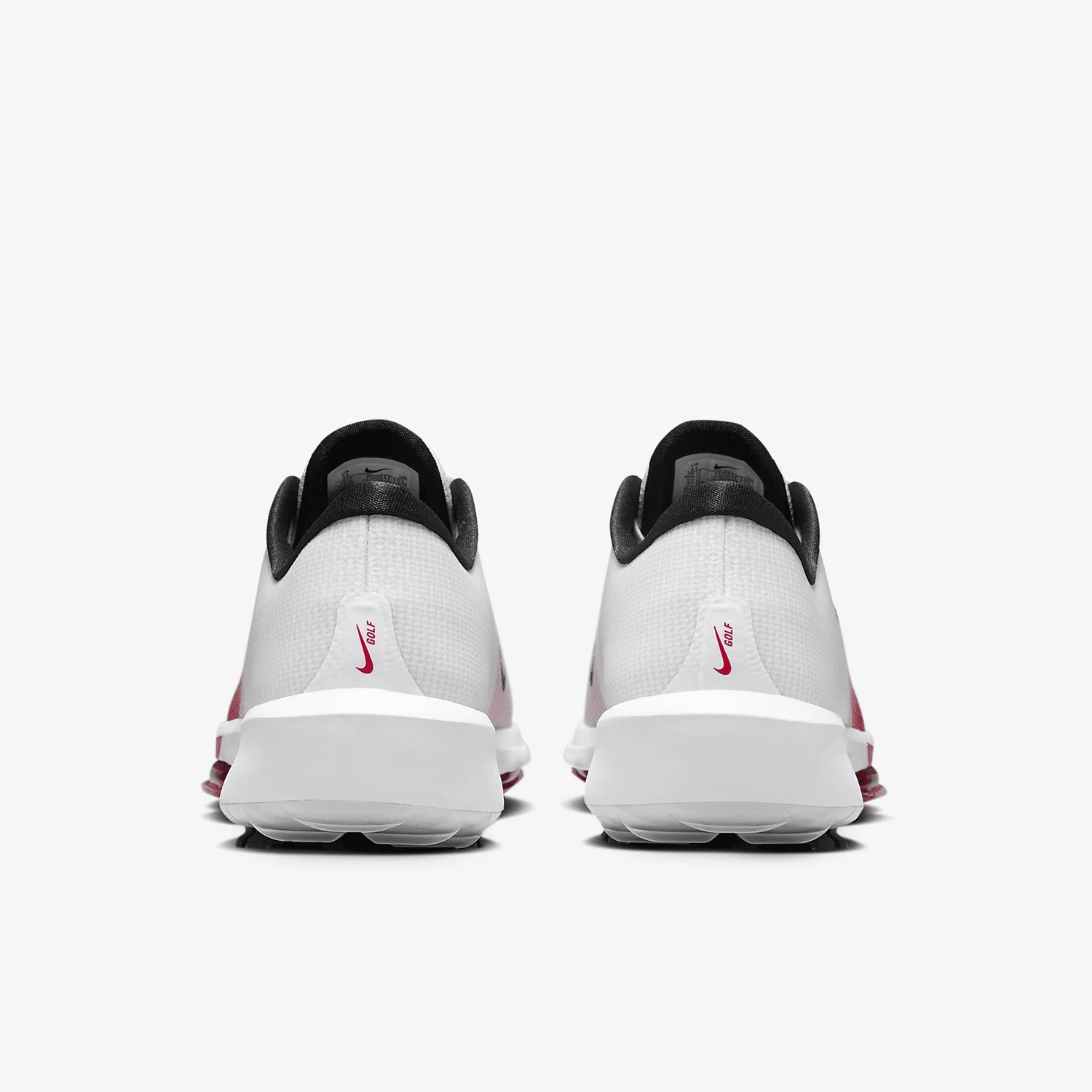 A pair of Nike sneakers shown from the back, featuring a white mesh upper, black collar lining, and a small red Nike Swoosh logo on the heel, set against a light gray background.