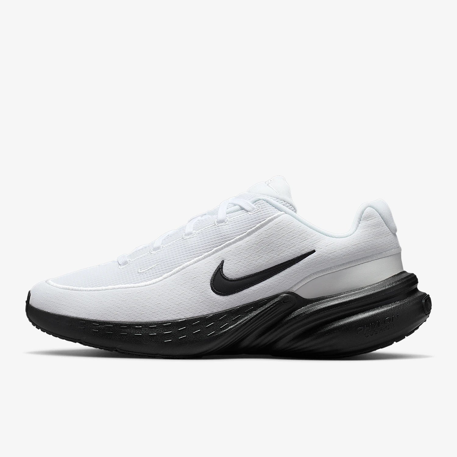 White running shoe with black sole and Nike logo on a white background