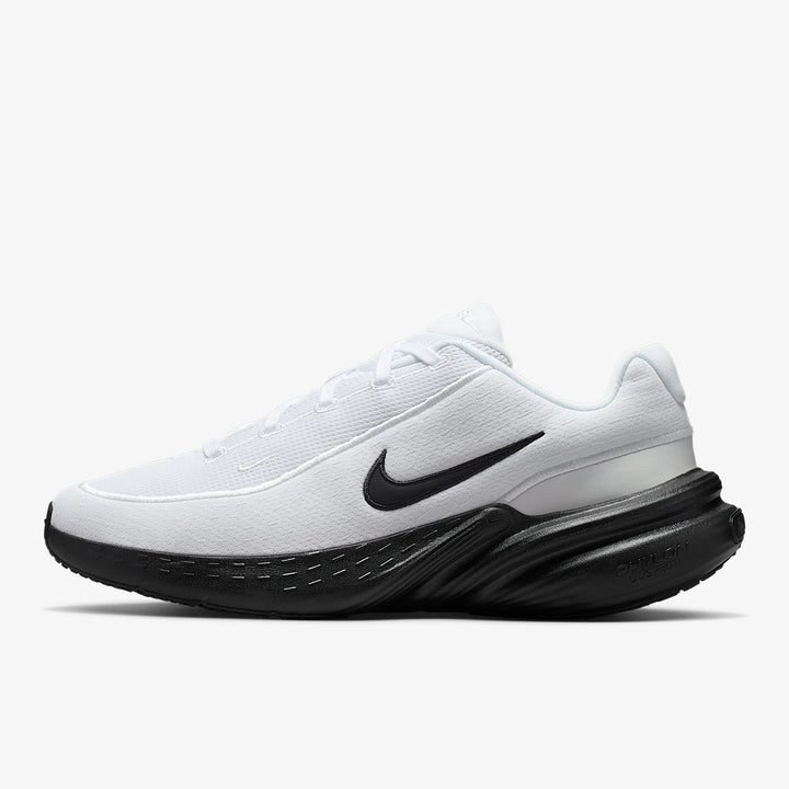White running shoe with black sole and Nike logo on a white background