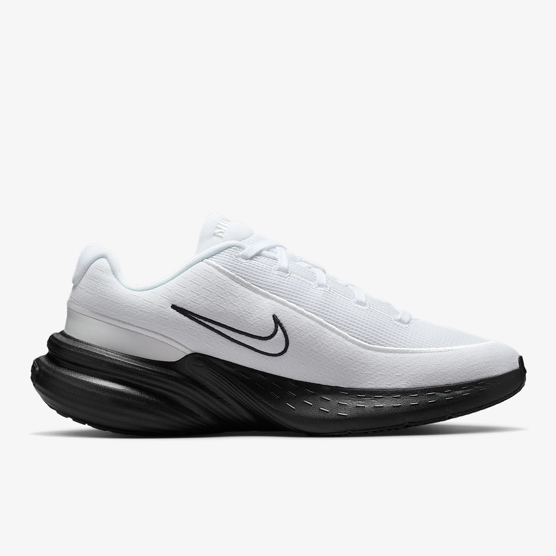 Black shoe with a strap on a white background