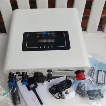 Electronic device with various cables and connectors on a white surface