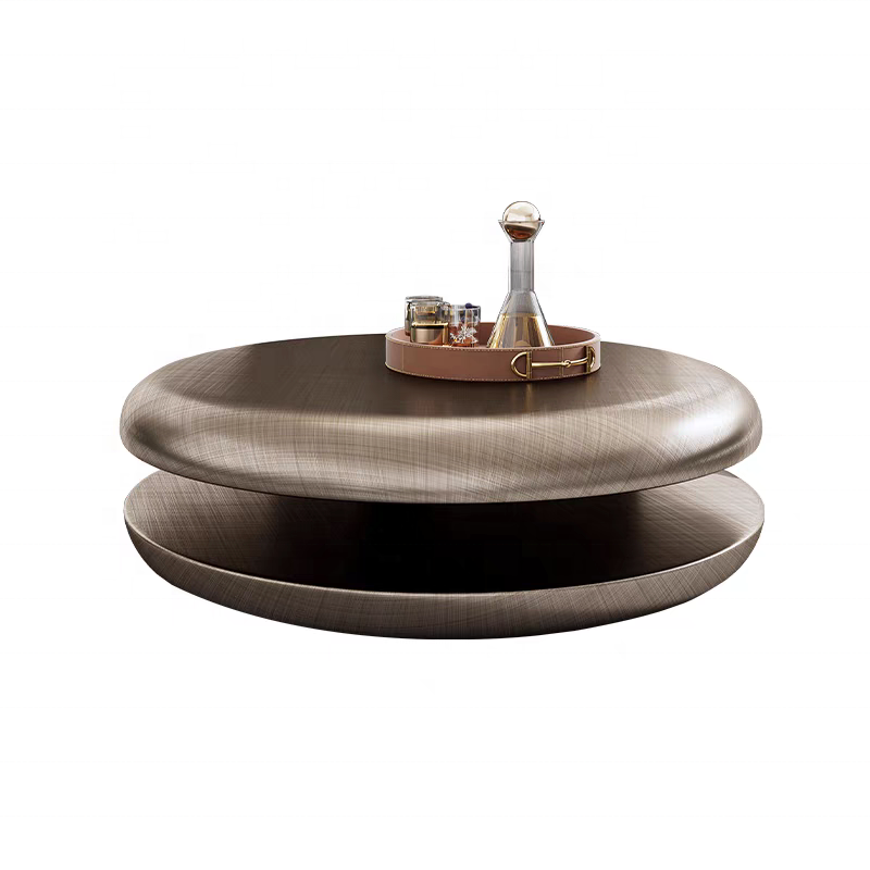 Bronze-colored round table with a tray on a white background