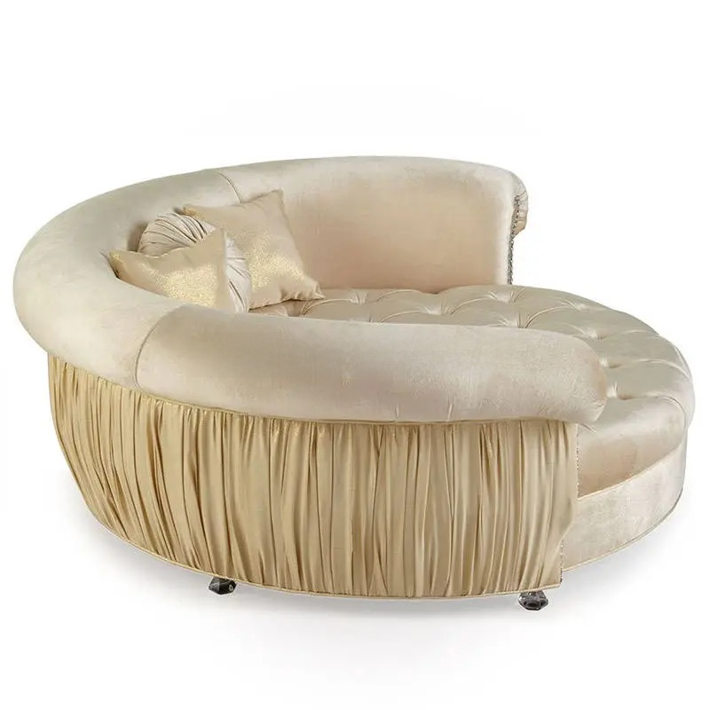Beige tufted sofa with decorative pillows on a white background
