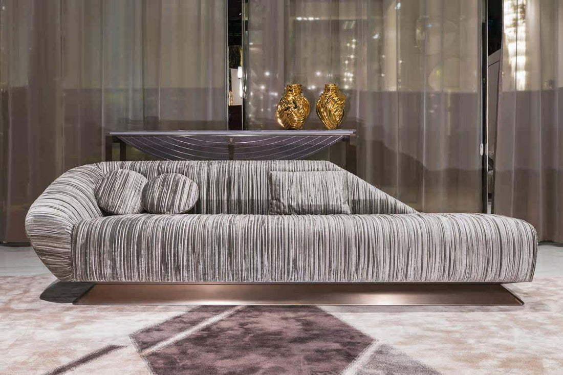 Modern gray sofa in a stylish room with decorative elements.