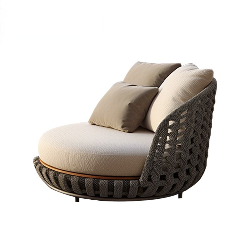 Modern outdoor chair with woven backrest and beige cushions on a white background