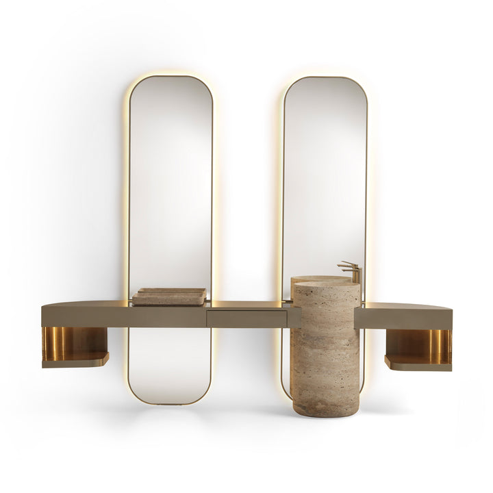 Modern wall-mounted bathroom vanity with two tall arched mirrors, a long horizontal console shelf, integrated side shelves, a cylindrical stone sink, and warm gold-toned lighting, shown on a white background.
