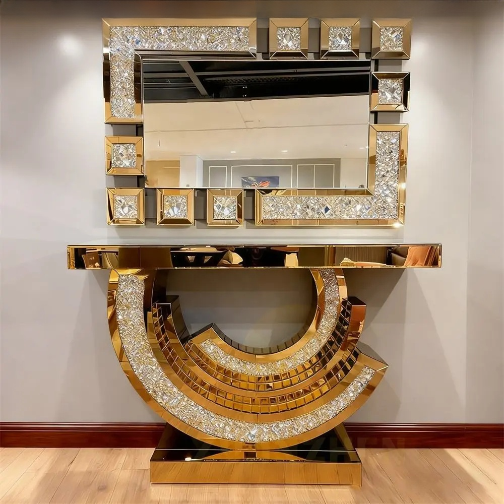 Decorative console table with mirror featuring crystal embellishments against a neutral wall.