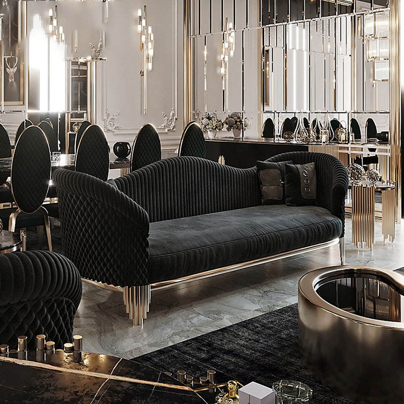 Luxurious interior with a dark gray sofa and decorative elements in a high-end setting.