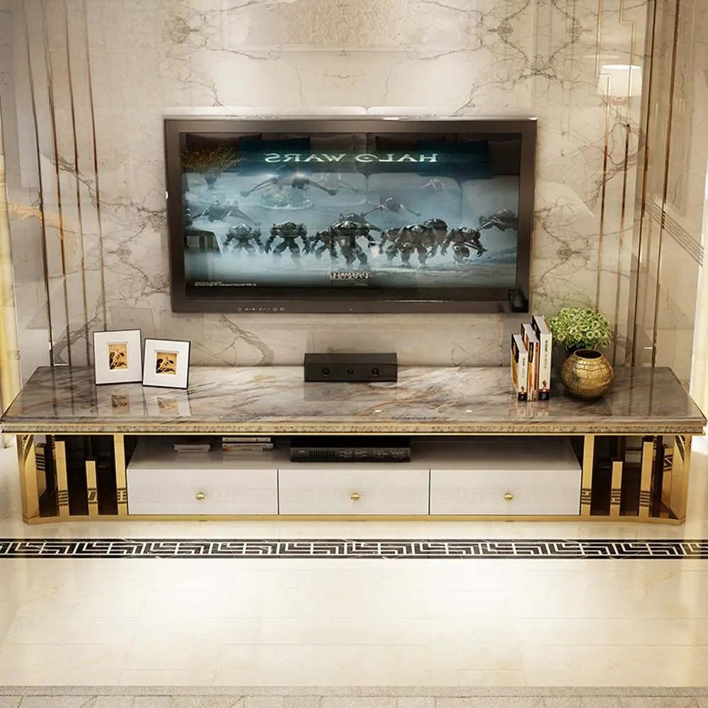 Modern living room with a television on a marble wall and a decorative console table.