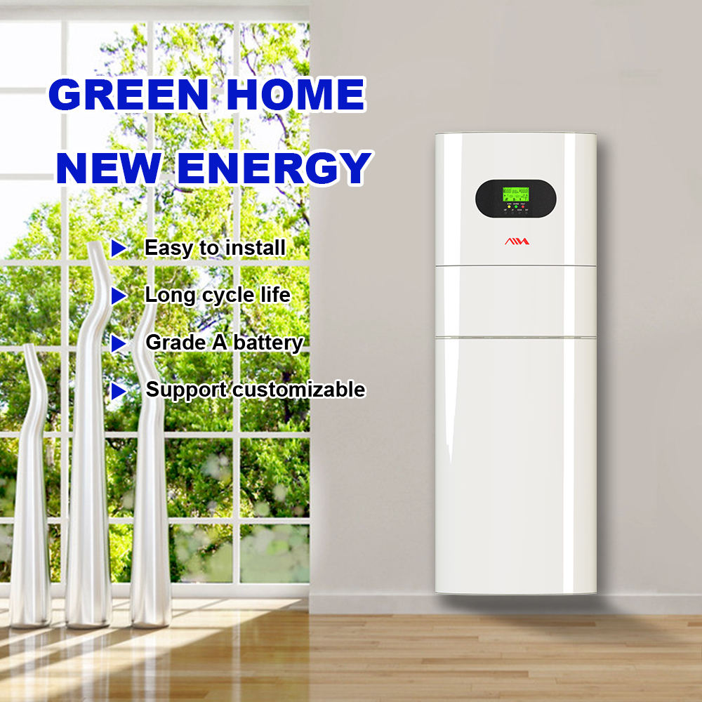 White battery pack with green energy text and features in a room with large windows showing trees.