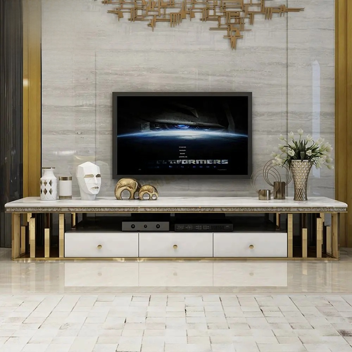 Modern living room with a television on a marble cabinet against a textured wall.