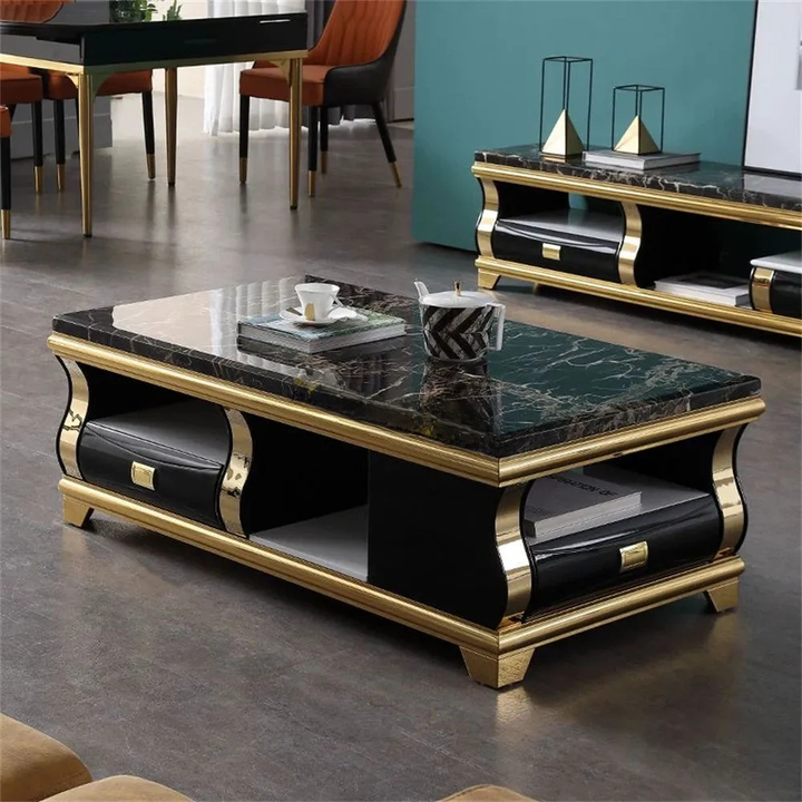 Luxury coffee table with marble top and gold accents in a modern living room.
