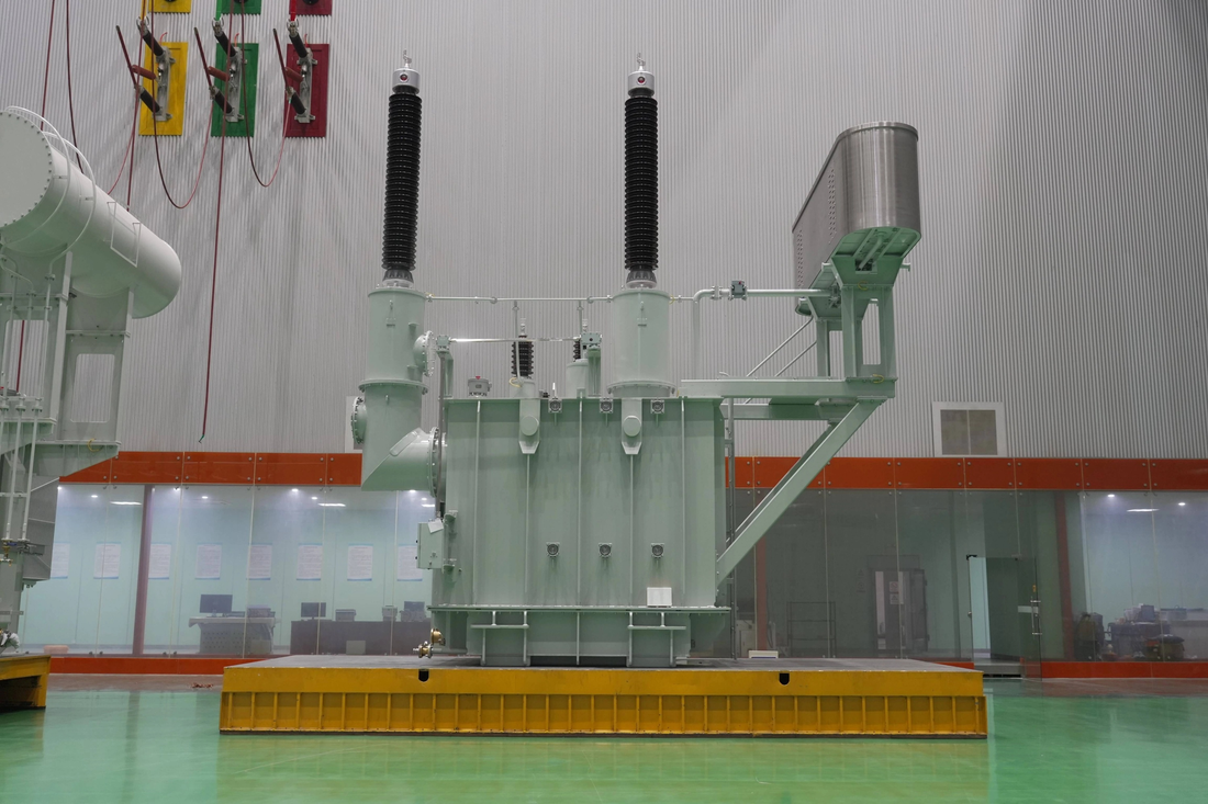 Large industrial transformer in a factory setting