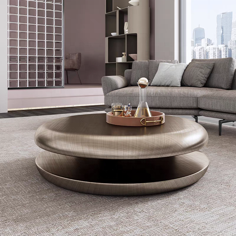 Modern living room with a stylish coffee table and gray sofa.