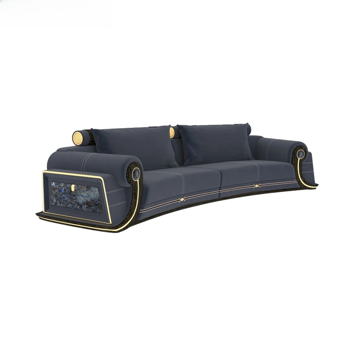 A luxury curved sofa in dark navy blue fabric with gold trim and decorative accents, shown on a plain white background.