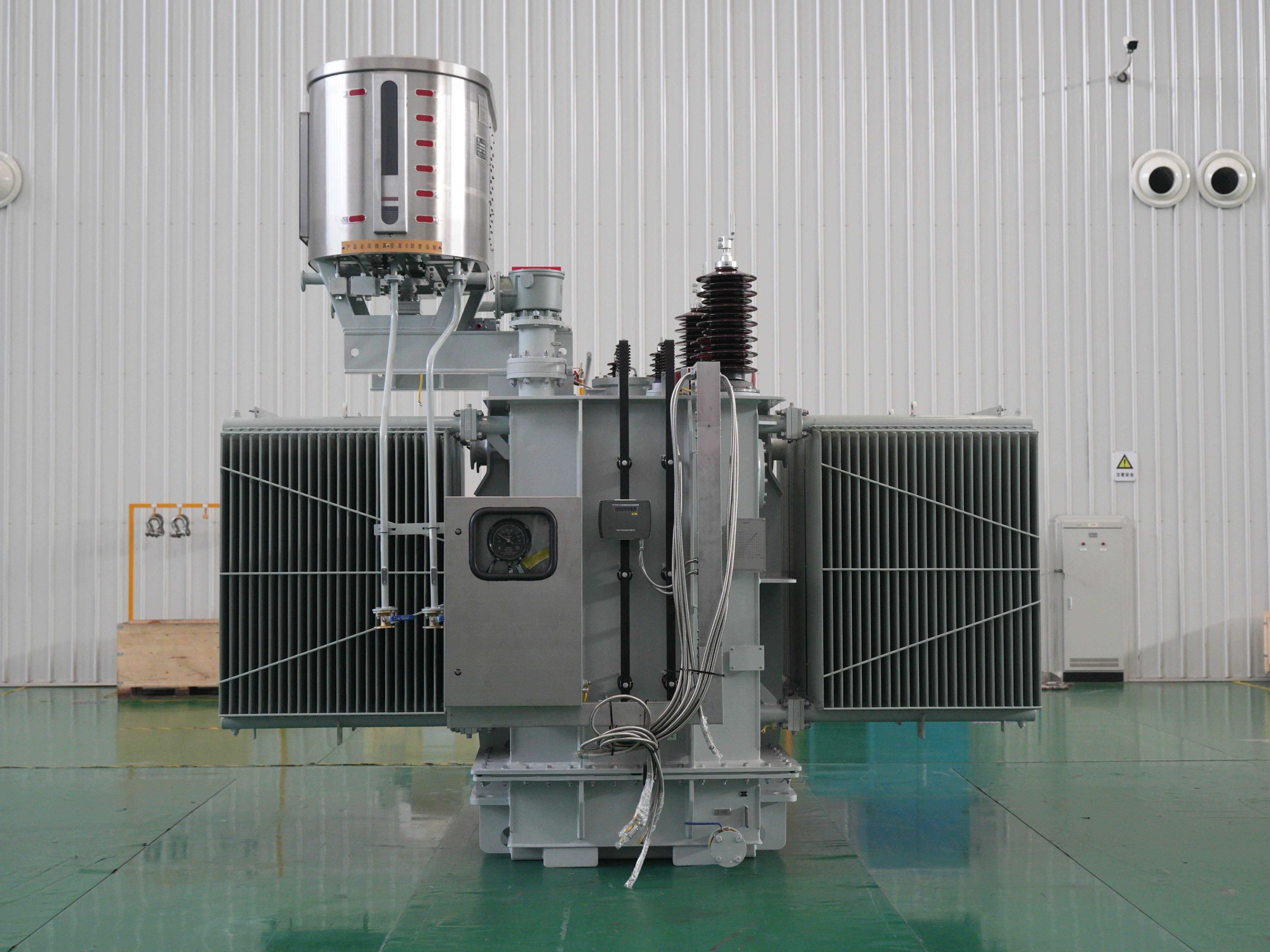 Large industrial railway transformer or electrical component in a warehouse setting