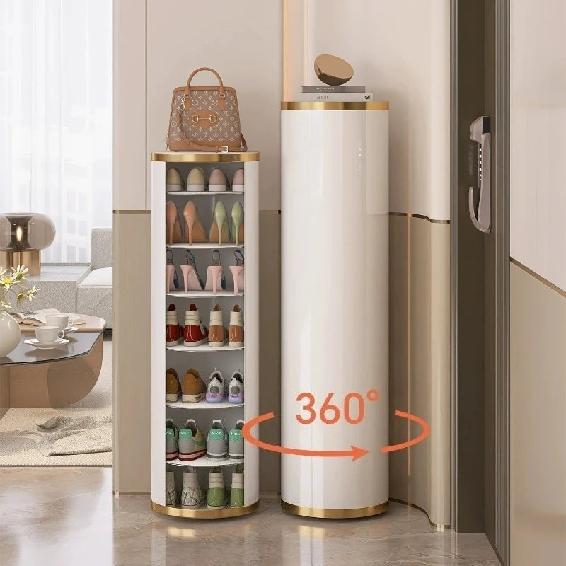 A white and gold shoe storage organizer shown in a modern hallway, with one side open to display multiple pairs of shoes and the other side closed. An orange arrow graphic with the text '360°' indicates the rotating/shifting function.