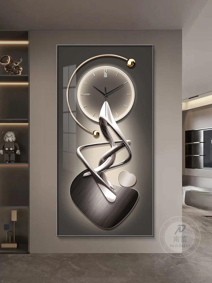 Decorative wall clock with abstract design on a gray wall.