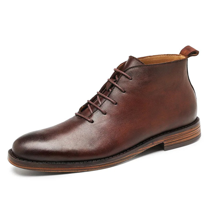 Brown leather boot with laces on a white background