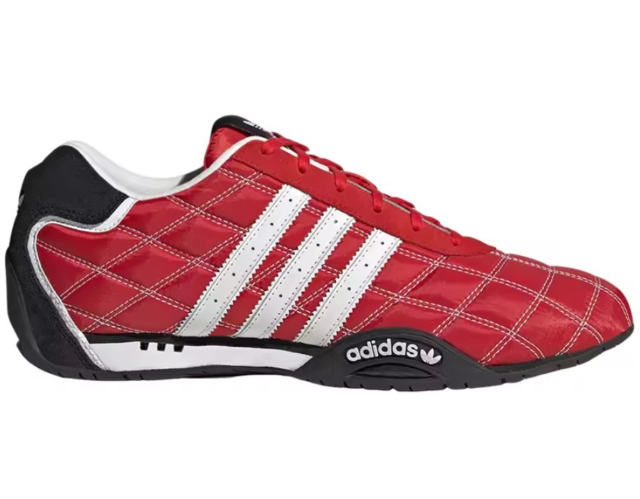 A red Adidas sneaker with a quilted pattern, featuring white three-stripes on the side, a black heel and sole, and the Adidas logo on the side of the midsole.