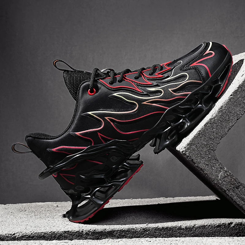 Black and red sneaker with flame design on a gray background