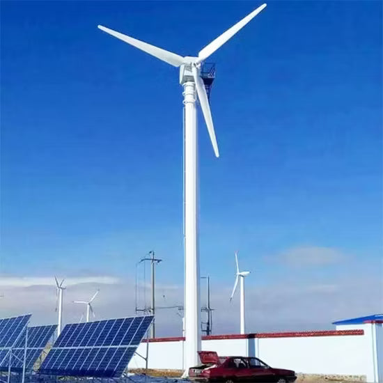 Wind turbines and solar panels under a clear blue sky