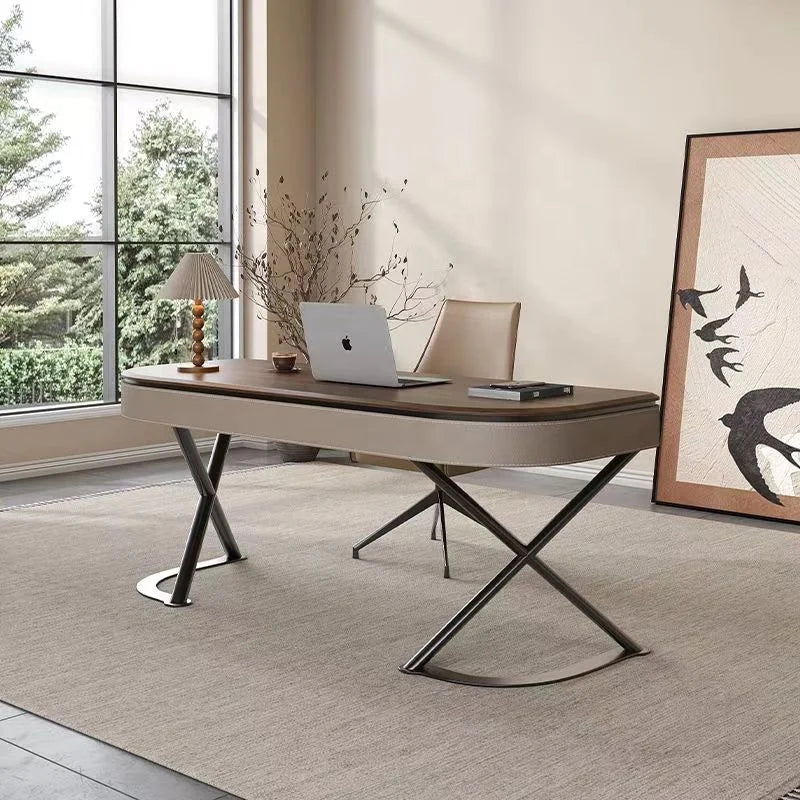 Modern office desk with laptop, chair, and decor in a bright room.