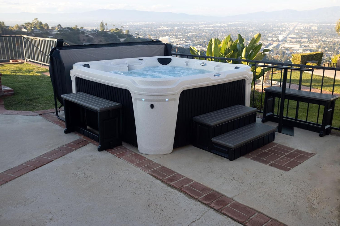 Hot tub on a patio with a scenic view of a cityscape